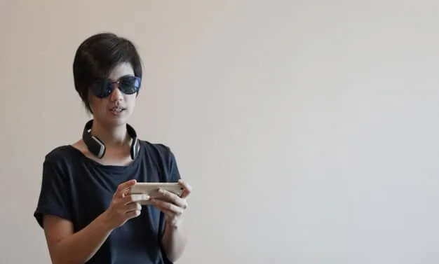 A person wearing AR glasses and using a mobile app to virtually place a piece of furniture in their living room, demonstrating the AR-powered