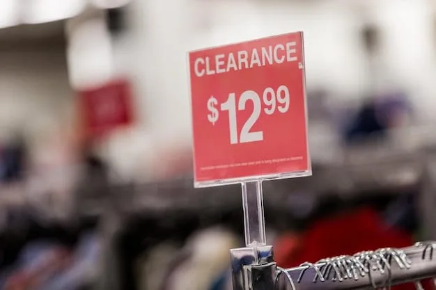 A close-up shot of a clearance tag on a product, showing a significantly reduced price. The background is slightly blurred, featuring shelves of similar items.