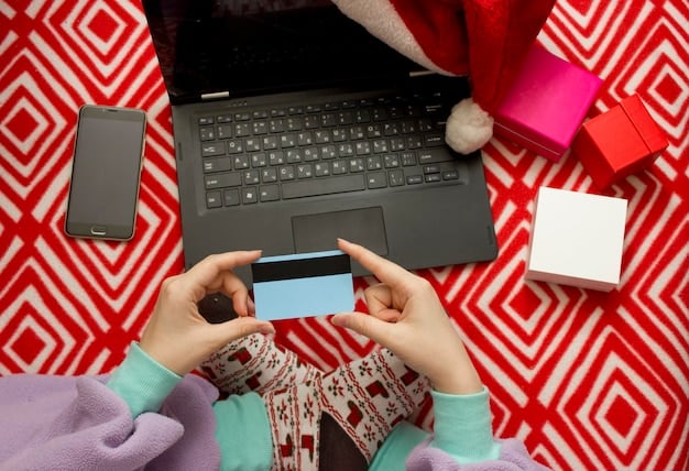 A hand holding a credit card with a rewards logo, hovering over a laptop displaying an online shopping cart with various items selected.