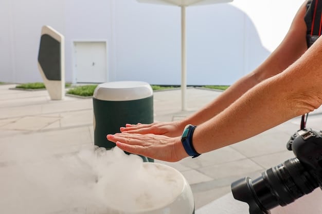 A photo of the Bluetooth speaker being taken out of the water tank after the 24-hour submersion, with a hand carefully holding it.