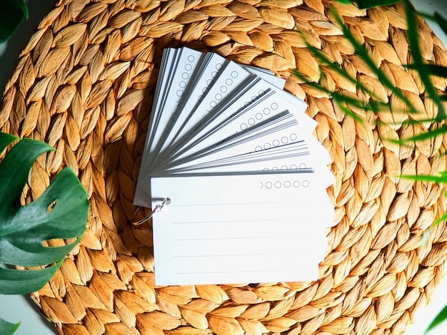 Close-up shot of neatly organized clipped coupons with various expiration dates, highlighting the detail and effort required for successful coupon stacking.